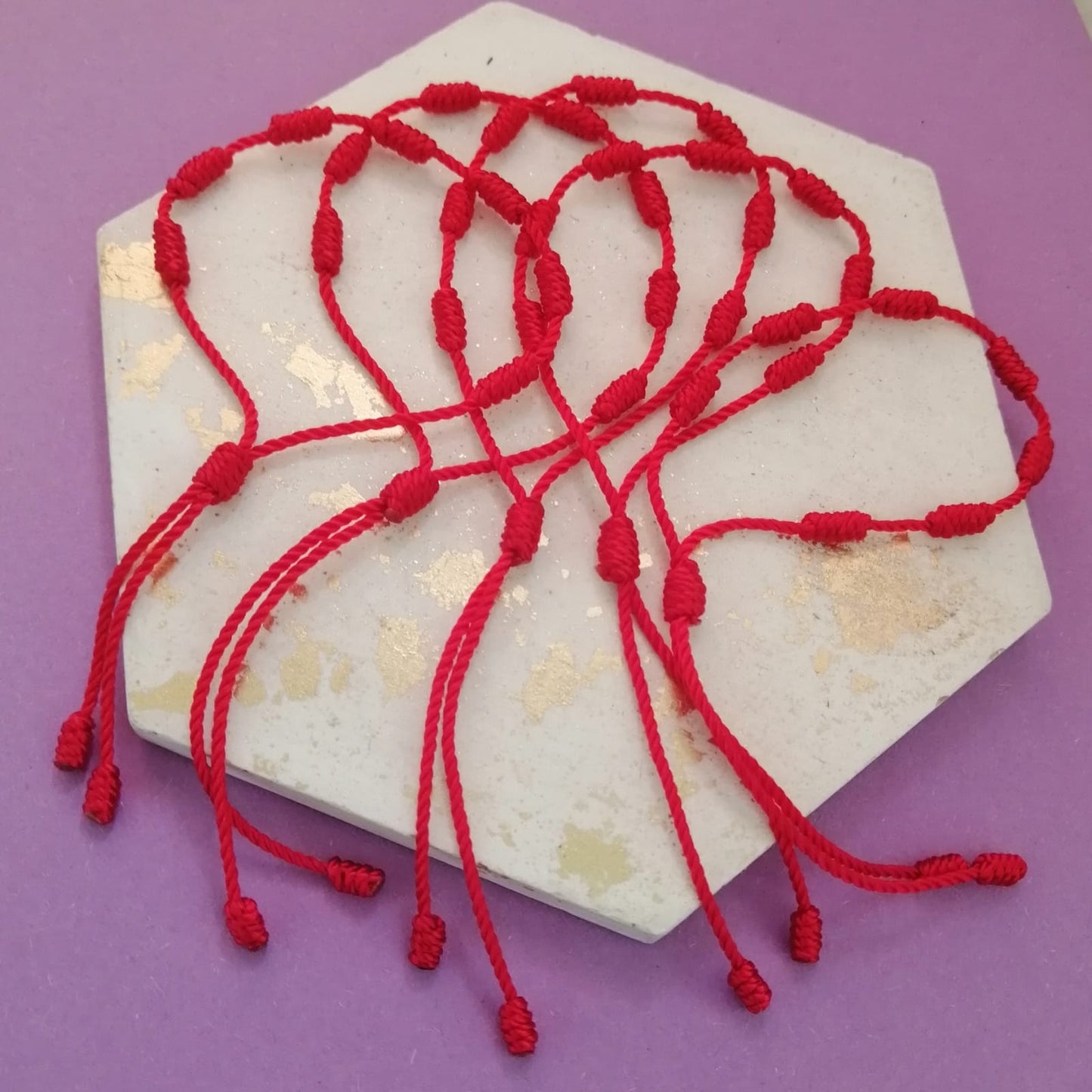 7 knot red bracelet