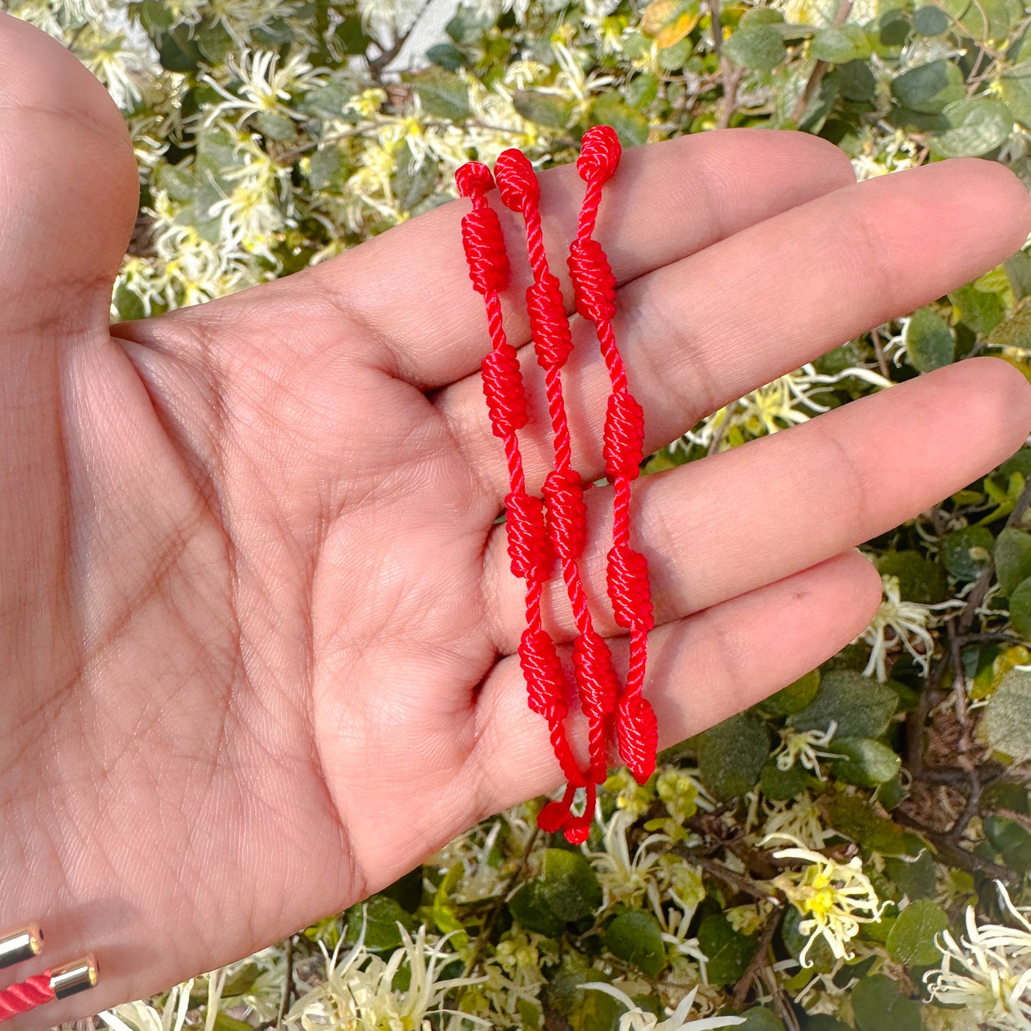 Pulsera roja de 7 nudos